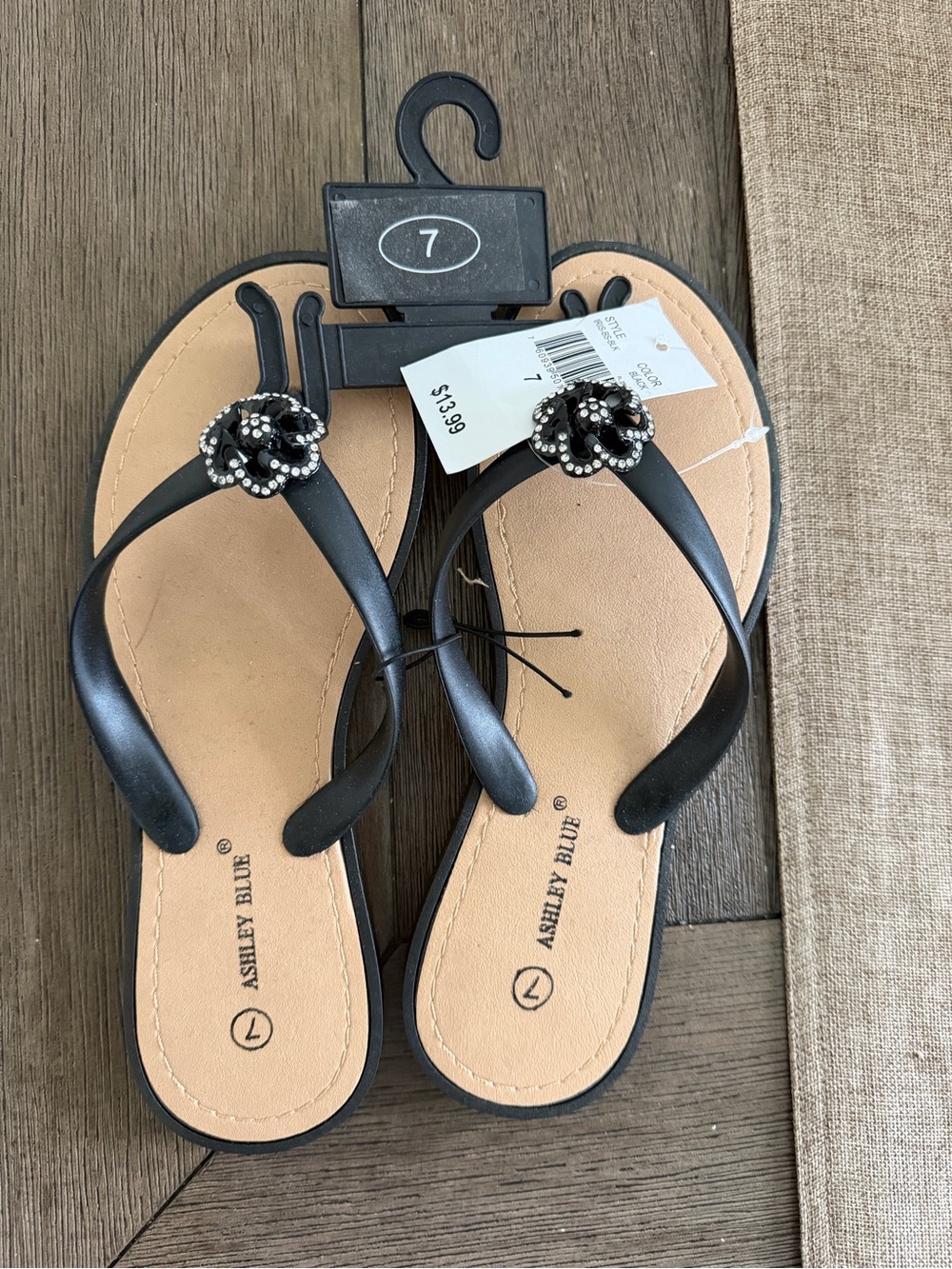 Ashley Blue Black Flip Flop Sandals with Floral Gem Accent